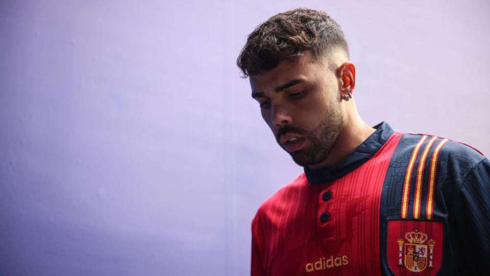     Spaniard David Raya walks through the tunnel