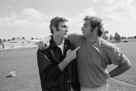 FILE - In this Jan. 5, 1972, file photo, Miami quarterback Bob Griese, left, and linebacker Nick Buoniconti talk about the upcoming Super Bowl against Dallas, in Miami. Pro Football Hall of Fame middle linebacker Nick Buoniconti, an undersized overachiever who helped lead the Miami Dolphins to the NFL's only perfect season, has died at the age of 78. Bruce Bobbins, a spokesman for the Buoniconti family, said he died Tuesday, July 30, 2019, in Bridgehampton, N.Y. (AP Photo/File)