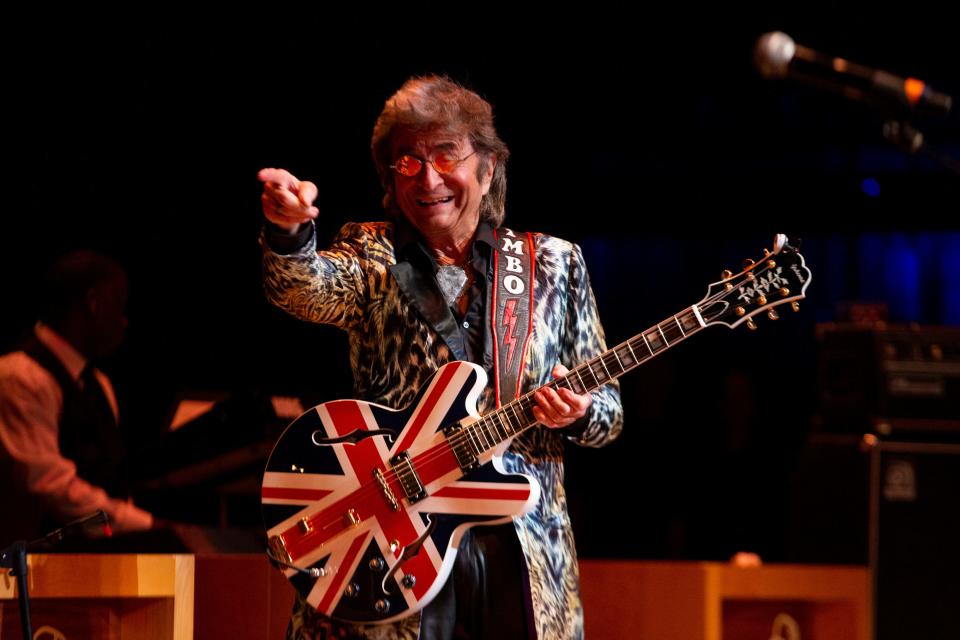 Jim Peterik, founder of the rock band Survivor, points as Jeff Adams of Starship walks on stage as they honor Jimi Jamison during the 2023 Memphis Music Hall of Fame Induction Ceremony at the Cannon Center for the Performing Arts in Memphis, Tenn., on Thursday, October 12, 2023.