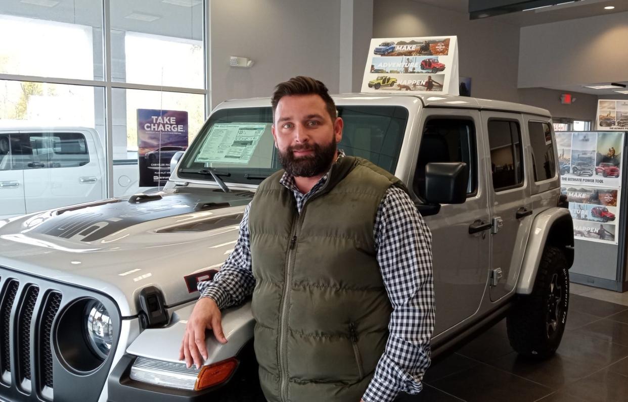 John Korkowski, executive manager of Dunhill Auto Group, Ltd., South Amboy, New Jersey, in the B&B Chrysler Dodge Jeep Ram showroom in Honesdale. The company where he works has purchased the business from the Carmody family, which has owned and operated it since 1970. The new name will be Honesdale Chrysler Dodge Jeep Ram.