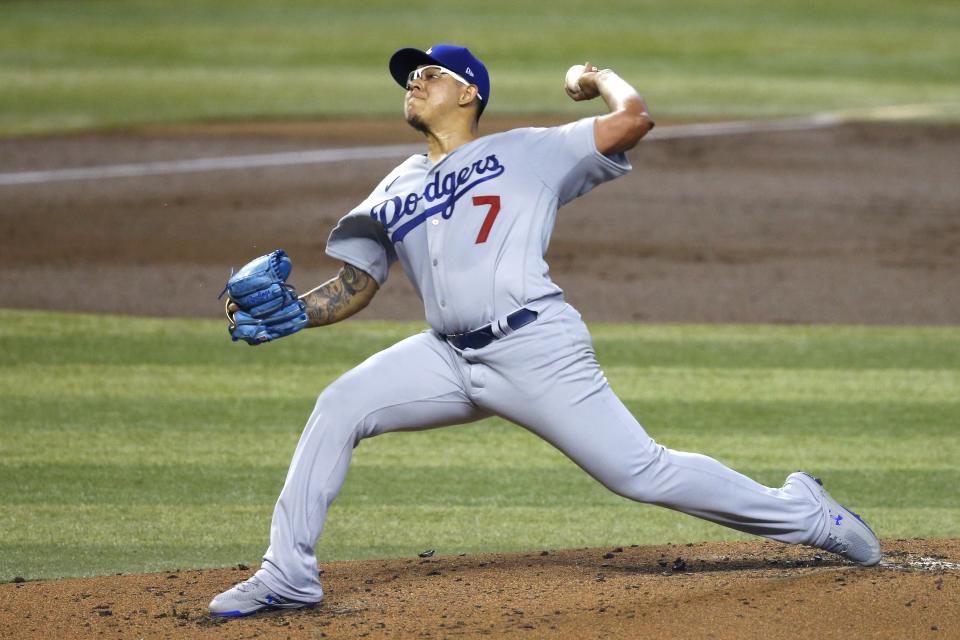 Los Angeles Dodgers starting pitcher Julio Urias throws to an Arizona Diamondbacks batter during the first inning of a baseball game Saturday, Aug. 1, 2020, in Phoenix. (AP Photo/Ross D. Franklin)