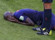 Netherlands defender Bruno Martins Indi <a href="https://sports.yahoo.com/news/dutch-defender-martins-indi-not-151006310--sow.html" data-ylk="slk:suffered a concussion;elm:context_link;itc:0;sec:content-canvas;outcm:mb_qualified_link;_E:mb_qualified_link;ct:story;" class="link  yahoo-link">suffered a concussion</a> after being fouled by Australia's Tim Cahill and landing hard. Martins Indi spent a night in hospital and missed the next game against Chile, but returned to training a few days later. (Marko Djurica/Reuters)