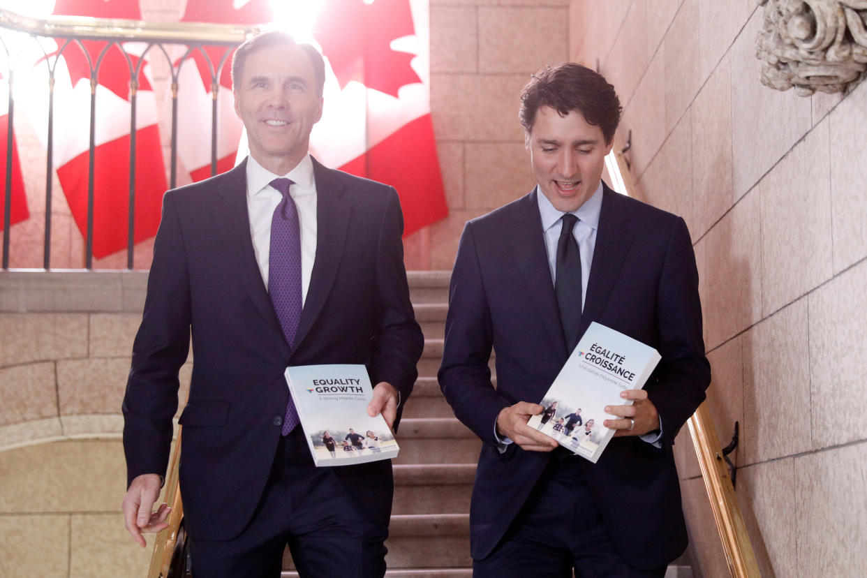Canada’s Prime Minister Justin Trudeau and Minister of Finance Bill Morneau walk to the House of Commons to deliver the budget on Parliament Hill in Ottawa, Ontario, Canada, February 27, 2018. (REUTERS/Blair Gable)