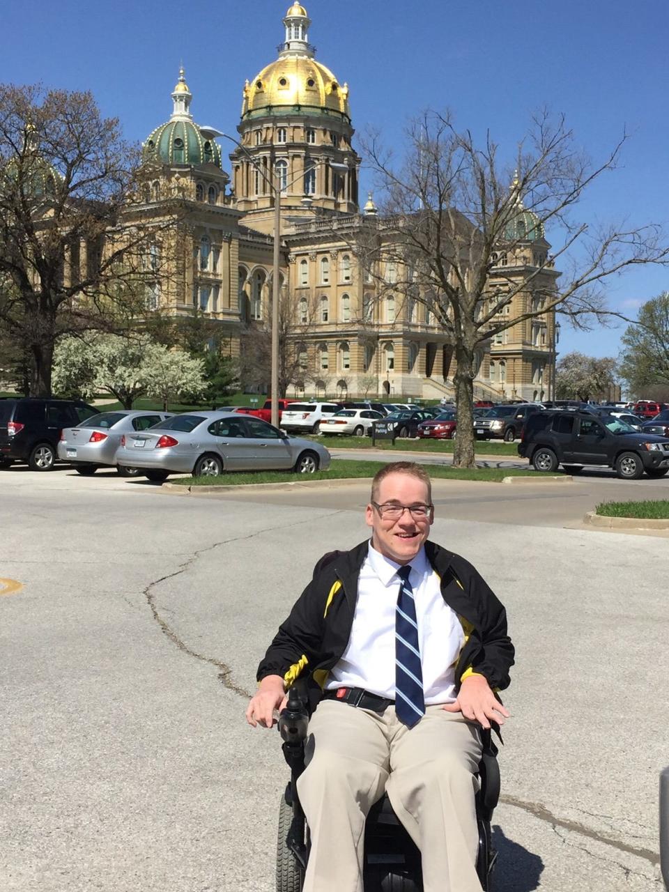Robert Fisher, 42, is a member of the Iowa Developmental Disability Council. Among other projects, Fisher has worked with the city of Adel to make sidewalks more accessible for people with physical disabilities.