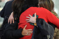 Members of the staff comfort each other during a ceremony at Brussels Zaventem airport, commemorating the second anniversary of twin attacks at Brussels airport and a metro train in Brussels, Belgium March 22, 2018. REUTERS/Eric Vidal