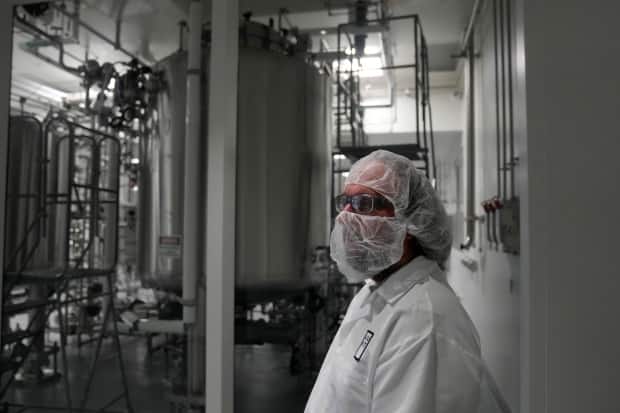 An employee stands outside the bioreactor suite of Eat Just, maker of 'lab grown' or 'cultivated' meat in Alameda, Calif., on June 14, 2023.