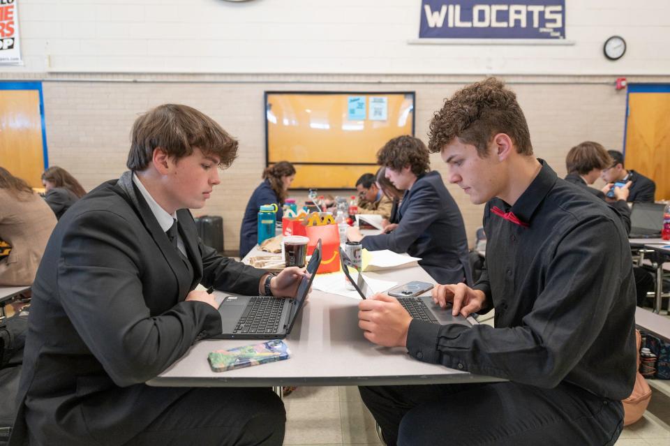 Pueblo Centennial High School seniors Sam Francis, left, and Jacob Welte research during the state speech and debate tournament at Pueblo Central High School on Friday, February 23, 2024.