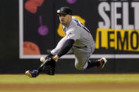 Miami Marlins' Adam Duvall can't catch a double hit by Arizona Diamondbacks' Josh Rojas during the fifth inning of a baseball game, Tuesday, May 11, 2021, in Phoenix. (AP Photo/Matt York)