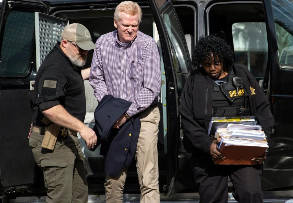 Alex Murdaugh is escorted back into the courtroom for his double murder trial at the Colleton County Courthouse on Wednesday (AP)