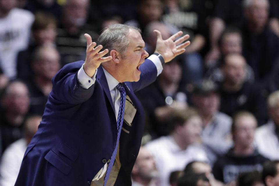 Rutgers head coach Steve Pikiell yells from the bench during the first half of an NCAA college basketball game against Purdue in West Lafayette, Ind., Saturday, March 7, 2020. (AP Photo/Michael Conroy)