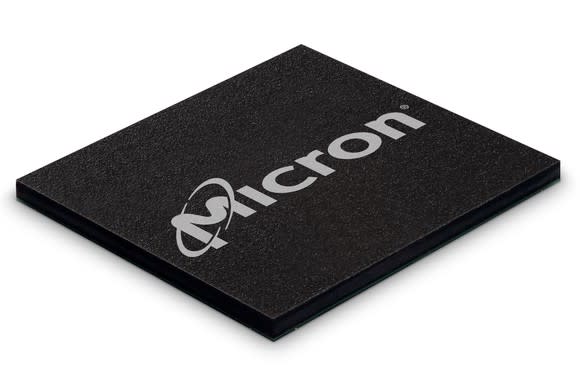 Micron's logo, stamped in gray on a black NAND memory chip.