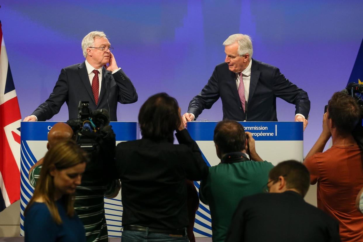 UK negotiator David Davis, left, and his EU counterpart Michel Barnier at a news conference following Brexit talks: EPA