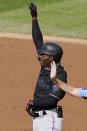 Miami Marlins Jazz Chisholm gestures to the Marlins dugout after hitting a two-run double during the second inning of a baseball game against the New York Yankees, Sunday, Sept. 27, 2020, at Yankee Stadium in New York. (AP Photo/Kathy Willens)