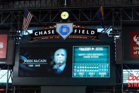 Aug 25, 2018; Phoenix, AZ, USA; Tribute is paid to former United States Senator John McCain during the fifth inning of the game between the Arizona Diamondbacks and the Seattle Mariners at Chase Field. Mandatory Credit: Joe Camporeale-USA TODAY Sports