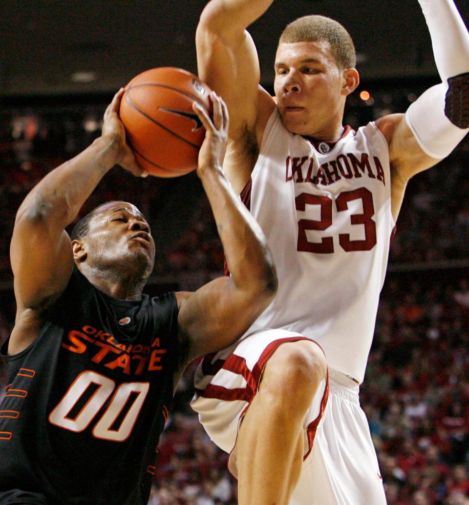 OSU's Byron Eaton (00) tries to get the ball past OU's Blake Griffin (23) in the first half of the Bedlam men's college basketball game between Oklahoma State and Oklahoma as Lloyd Noble Center in Norman, Okla., Saturday, March 7, 2009. PHOTO BY NATE BILLINGS, THE OKLAHOMAN
