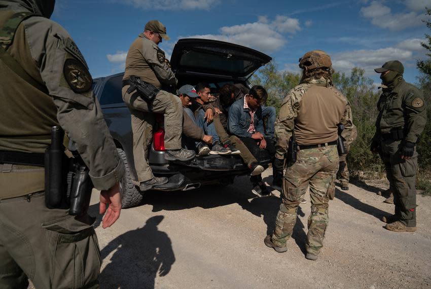 Texas Department of Public Safety special agents apprehend five undocumented immigrants from Honduras who were caught on private property in Kinney County as part of Operation Lone Star. Some Democrats in Congress are questioning whether federal COVID-19 aid might have been improperly diverted to the state border operation.