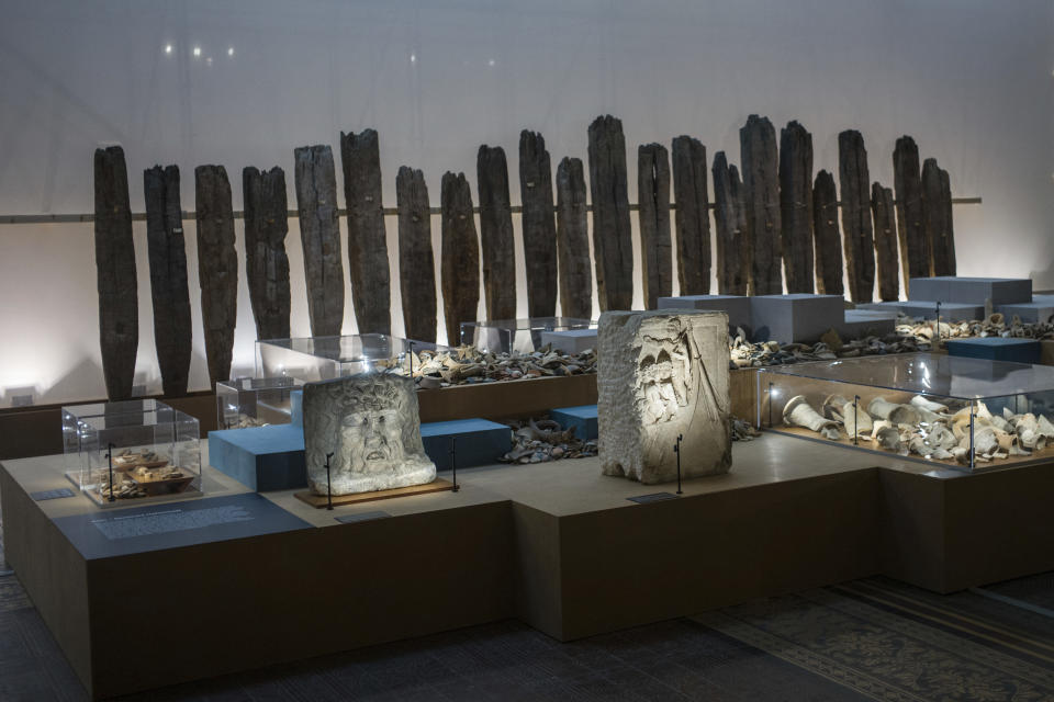 The Sept. 20, 2018 photo shows an archeological exhibition with pieces of the Roman-era displayed at the Martin-Gropius-Bau museum in Berlin. The new exhibition showcasing more than 1,000 major archaeological finds from the past 20 years shows reveals how Germany has been at the heart of European trade, migration, conflict and innovation since the Stone Age. The exhibition runs from Sept. 21, 2018 until Jan. 6, 2019. (AP Photo/Markus Schreiber)