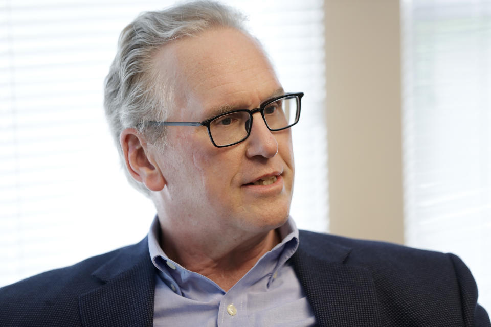 FILE - In this Tuesday, April 18, 2017, file photo, then-Tennessee Valley Authority CEO Bill Johnson answers questions during an interview with The Associated Press in Nashville, Tenn. An audit has found instances where executives for the nation's largest public utility overspent on travel. (AP Photo/Mark Humphrey, File)