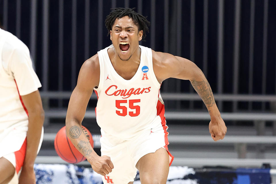 INDIANAPOLIS, INDIANA - MARCH 27: Brison Gresham #55 of the Houston Cougars reacts after scoring against the Syracuse Orange in the first half of their Sweet Sixteen game of the 2021 NCAA Men's Basketball Tournament at Hinkle Fieldhouse on March 27, 2021 in Indianapolis, Indiana. (Photo by Andy Lyons/Getty Images)