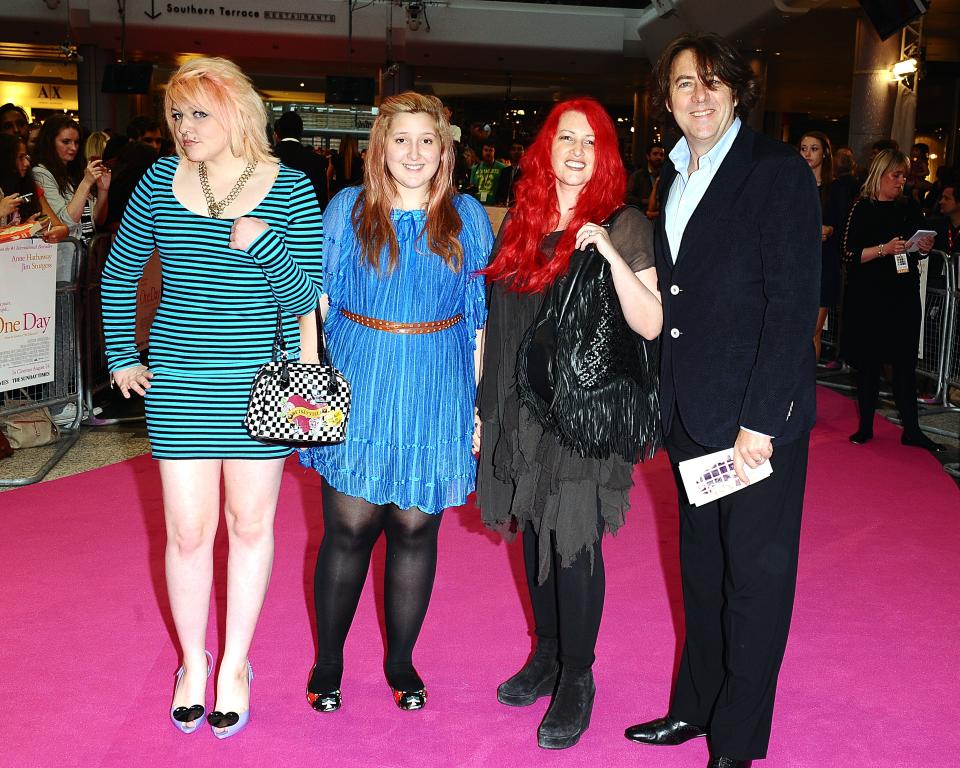 Jonathan Ross and wife Jane Goldman and their children Betty Kitten (left) and Honey Kinney (second left) arriving for the premiere of One Day at the Vue Cinema, Westfield Shopping Centre, White City.