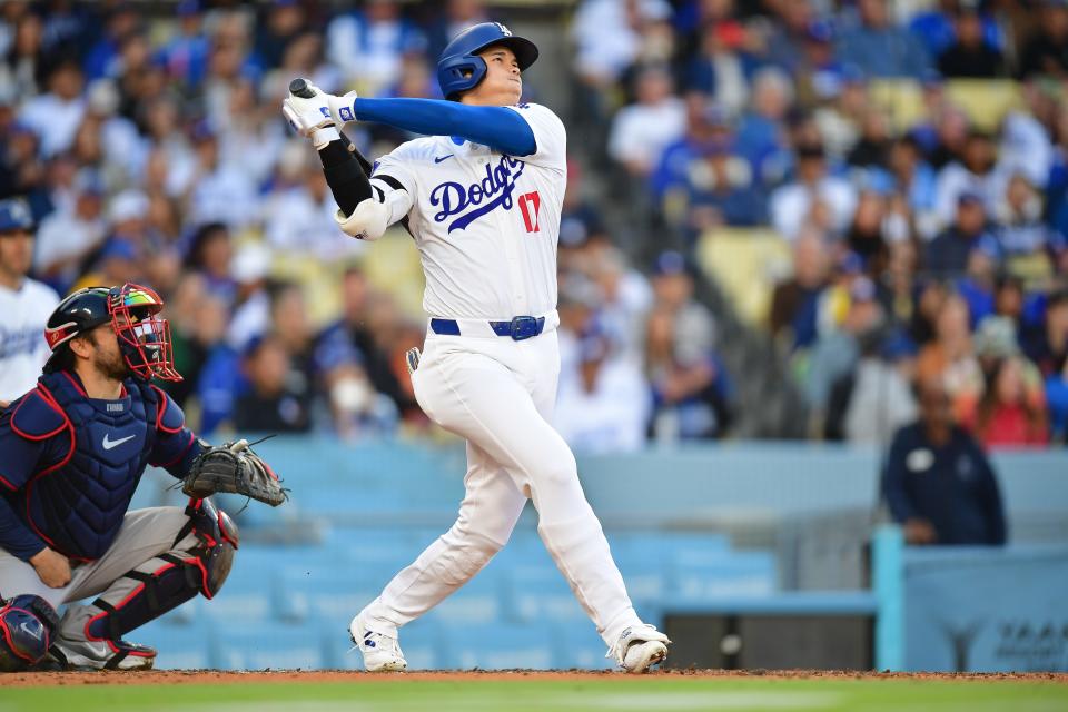 Shohei Ohtani blasts a solo home run on Saturday against the Braves, his eighth of the season, in L.A.'s 11-2 win.