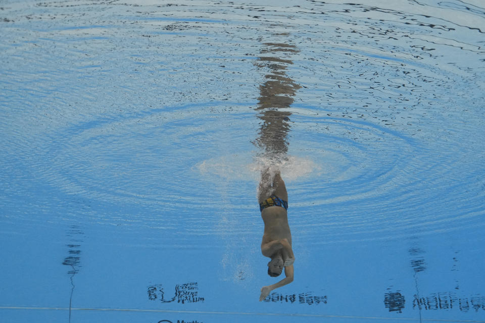 Gustavo Adolfo Sanchez of Colombia competes in the men's solo technical final of artistic swimming at the World Aquatics Championships in Doha, Qatar, Monday, Feb. 5, 2024. (AP Photo/Lee Jin-man)