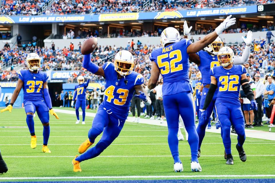 Chargers cornerback Michael Davis celebrates after intercepting a pass against the Denver Broncos in December.