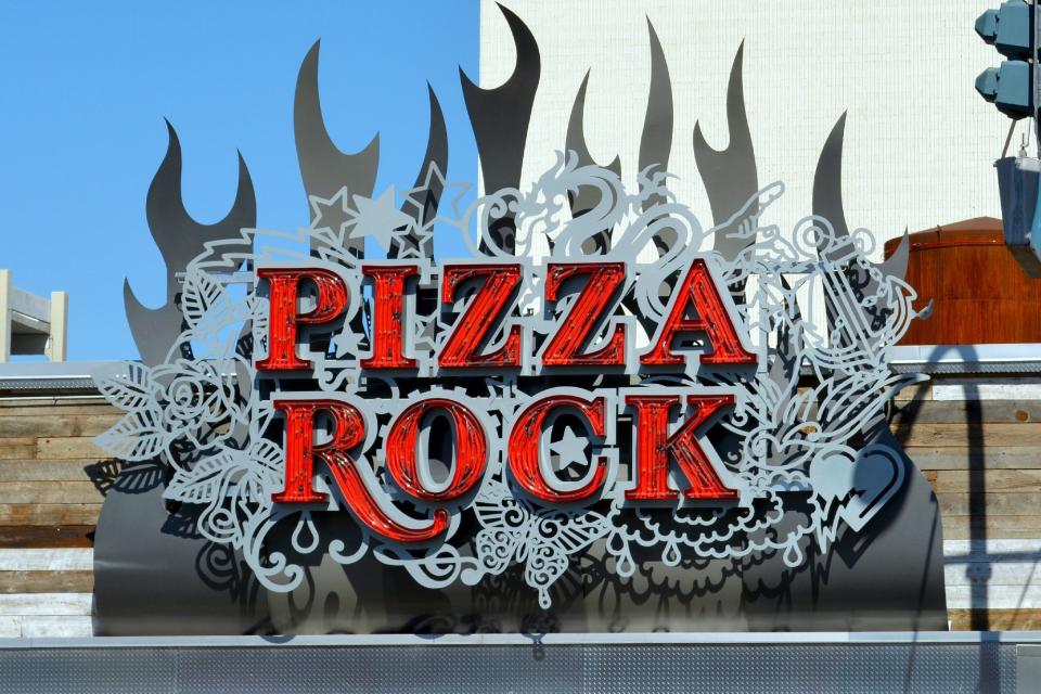 <p>Try: <a href="http://pizzarocklasvegas.com/">Pizza Rock</a>, an appropriately wild-looking spot that "takes pizza to the next level."&nbsp;</p>