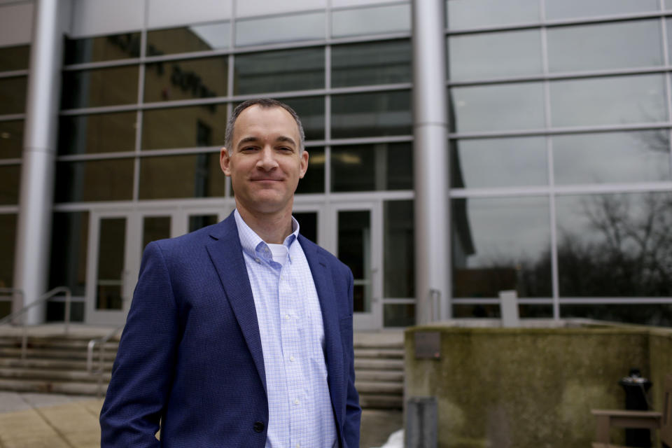 Charles Kroll, CFO of Crystal Flash, an employee-owned fuel distribution company, poses for a portrait outside of DeVos Place convention center during the annual State of Grand Rapids Business event on Jan. 31, 2024, in Grands Rapids, Mich. Kroll said he’s worried about the impact of President Joe Biden’s climate policies — he calls it the president's “war on oil and gas.” Kroll voted for Donald Trump in 2016, Biden in 2020 and is undecided this time. (AP Photo/Kristen Norman)