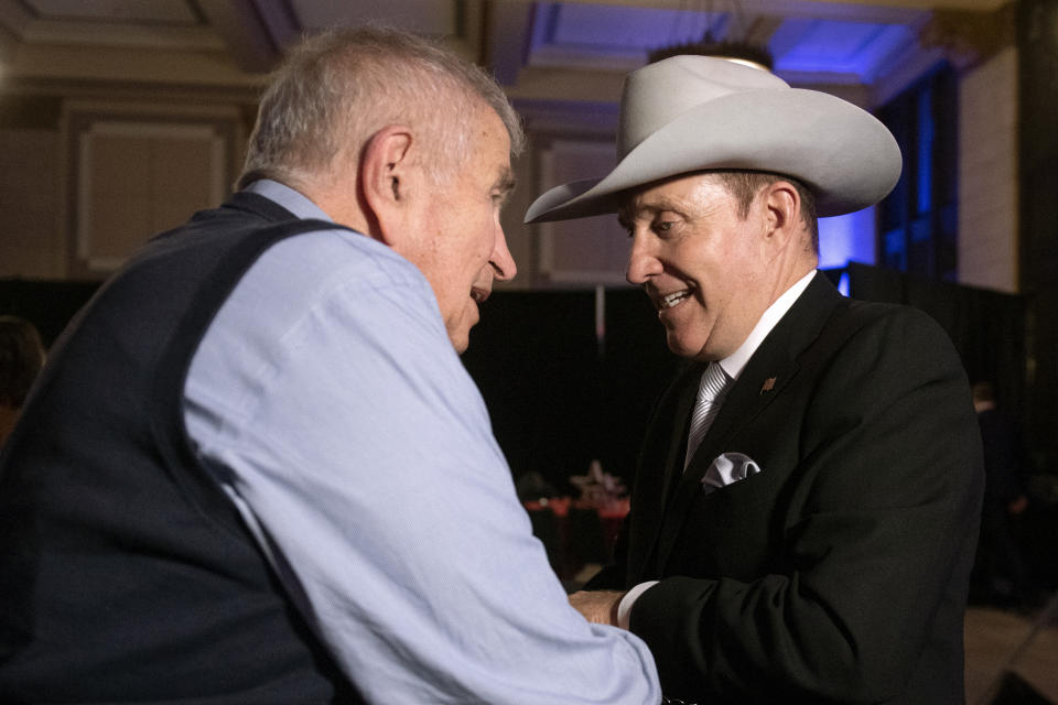 Nebraska Republican gubernatorial candidate Charles Herbster greets a supporter after his concession speech, Tuesday, May 10, 2022, in Lincoln, Neb. The race was called for Jim Pillen. (Justin Wan/Lincoln Journal Star via AP)