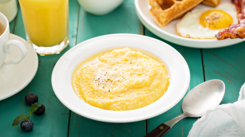 Bowl of grits on table