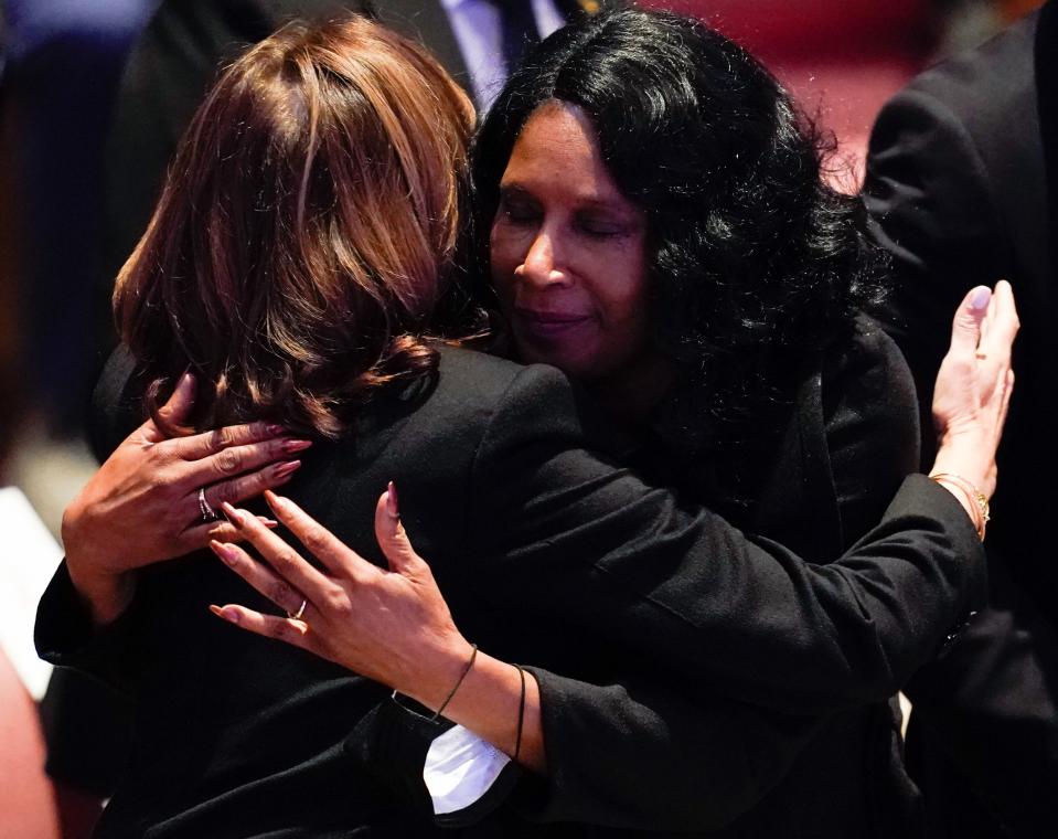 Vice President Kamala Harris, left, embraces RowVaughn Wells, the mother of Tyre Nichols, at his funeral service on 1 February. (Getty Images)