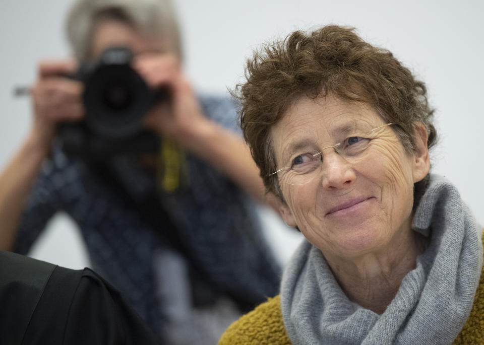 Gynaecologist Kristina Haenel sits in the courtroom of the state court in Giessen, Germany, Thursday, Dec. 12, 2019. Gynaecologist Kristina Haenel has been convicted again of violating a ban on advertising abortions. (Boris Roessler/dpa via AP)