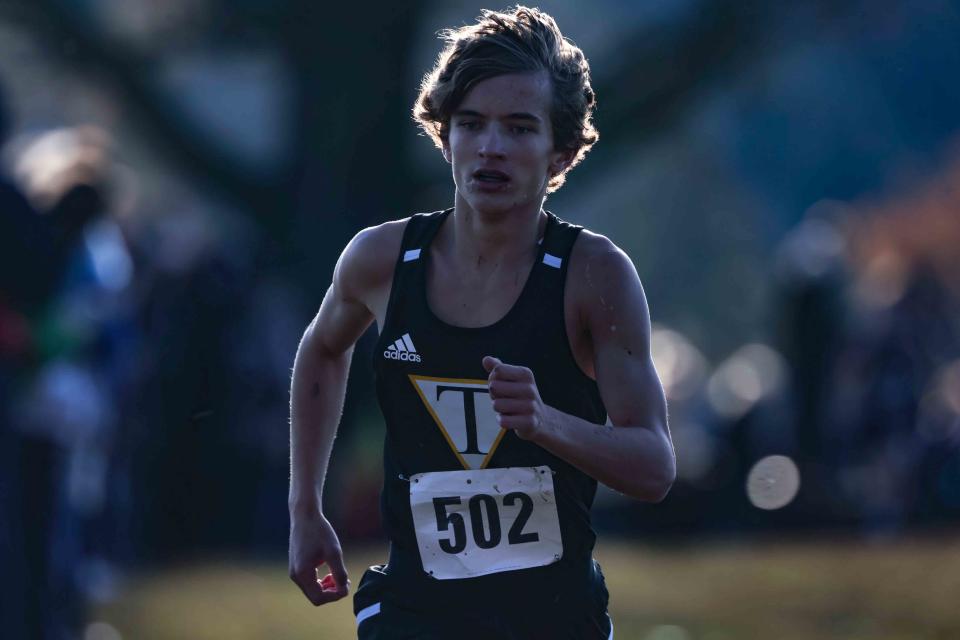 Michael McGinley of Tatnall runs in the Division II boys race at the DIAA Cross Country Championships.