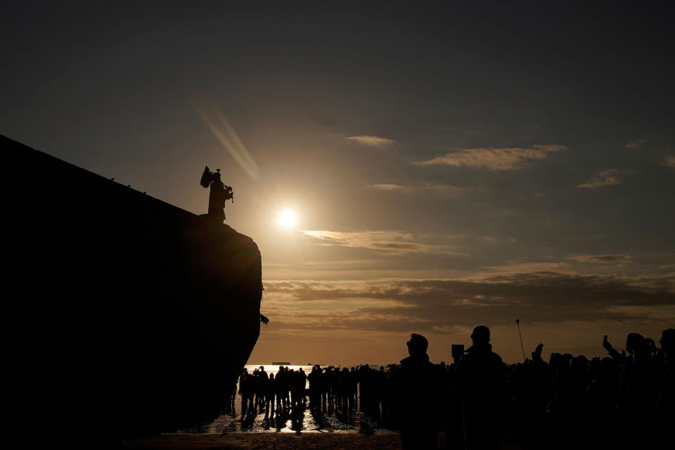 ARROMANCHES LES BAINS, FRANCE - JUNE 6: Pipe Major Trevor Macey-Lillie of the Scots Royal artillery stands on a Mulberry harbour as he plays a replica set of Millin-Montgomery pipes at Mulberry harbour on the morning of the 75th anniversary of the D-Day landings on June 6, 2019 in Arromanches Les Bains, France. June 6th is the 75th anniversary of the D-Day landings which saw 156,000 troops from the allied countries including the United Kingdom and the United States join forces to launch an audacious attack on the beaches of Normandy, these assaults are credited with the eventual defeat of Nazi Germany.  (Photo by Christopher Furlong/Getty Images)