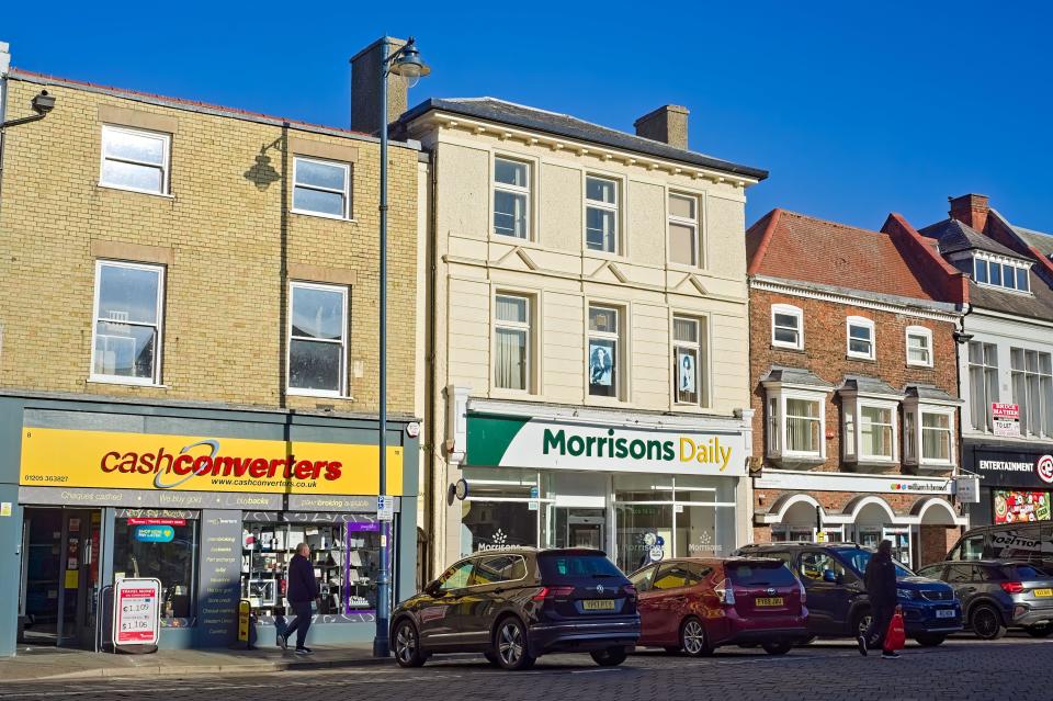 Cash-converters and Morrisons Daily stores along wide Bargate in the town centre