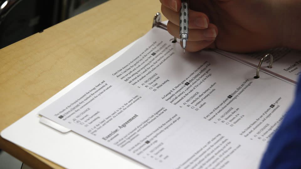 In this photo taken Jan. 17, 2016, a student looks at questions during a college test preparation class at Holton Arms School in Bethesda, Md. - Alex Brandon/AP