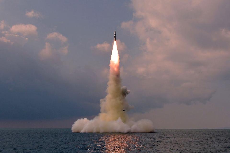 This picture released by state media shows the launch of a new submarine-launched ballistic missile near the city of Sinpo (AFP via Getty Images)