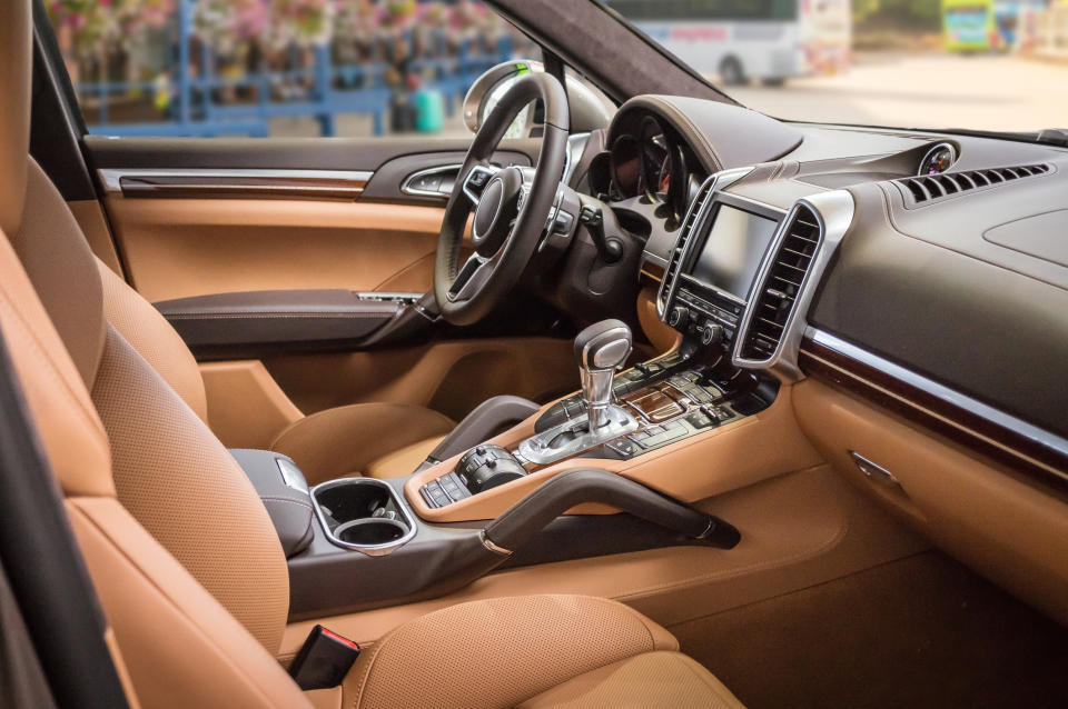 A luxury car interior in brown leather.