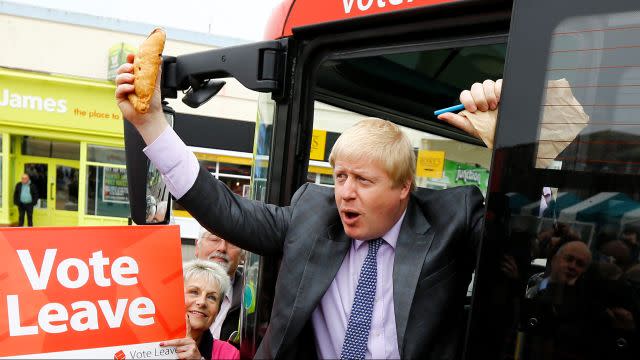 Former London Mayor Boris Johnson holds up a Cornish pasty during the launch of the Vote Leave bus campaign, in Truro