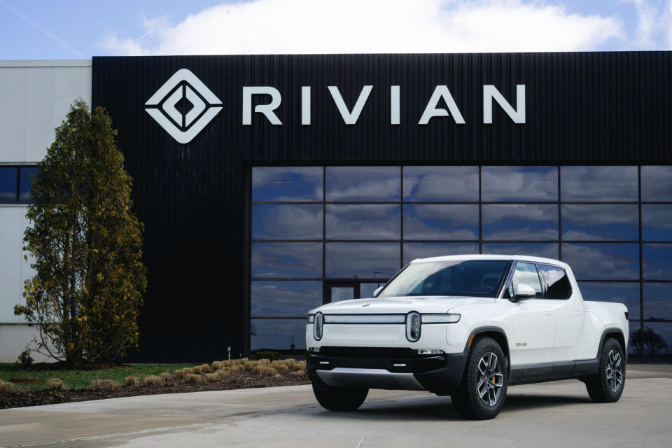 A Rivian R1T posed outside the entrance to the company’s Normal, Illinois plant. <p><em>Rivian</em></p>