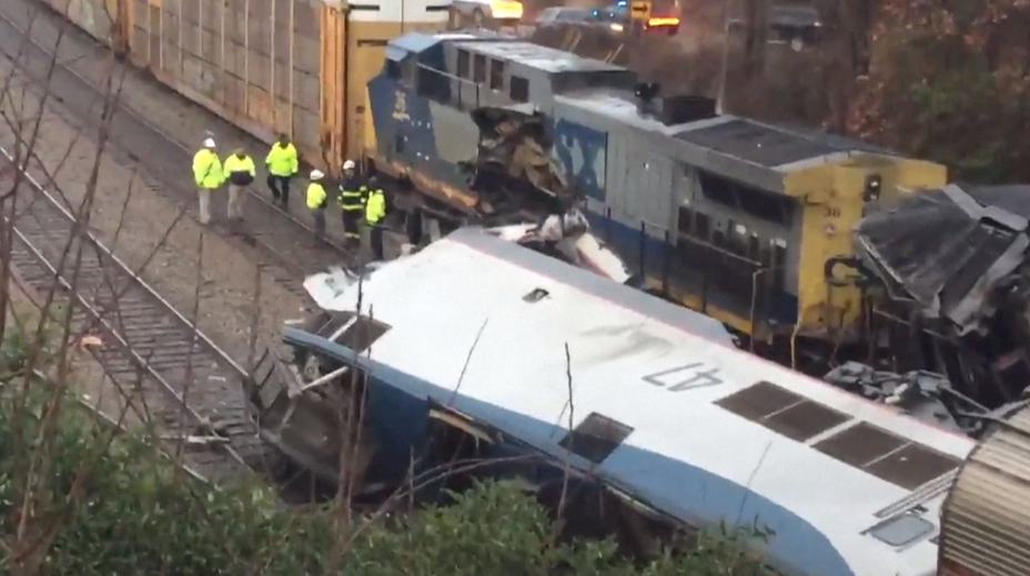 Crews assess the wreckage after an Amtrak passenger train slammed into a freight train in South Carolina on Sunday. (Photo: Getty Images)