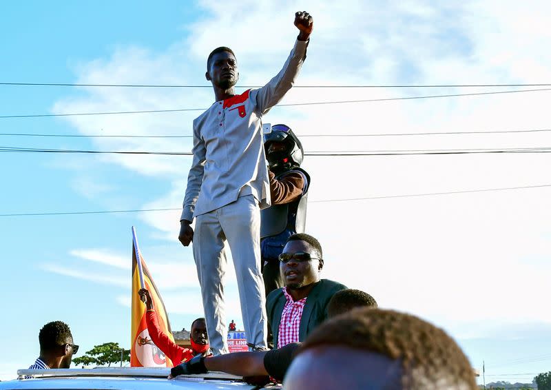 FILE PHOTO: Ugandan pop star and presidential candidate Bobi Wine campaigns near Kampala