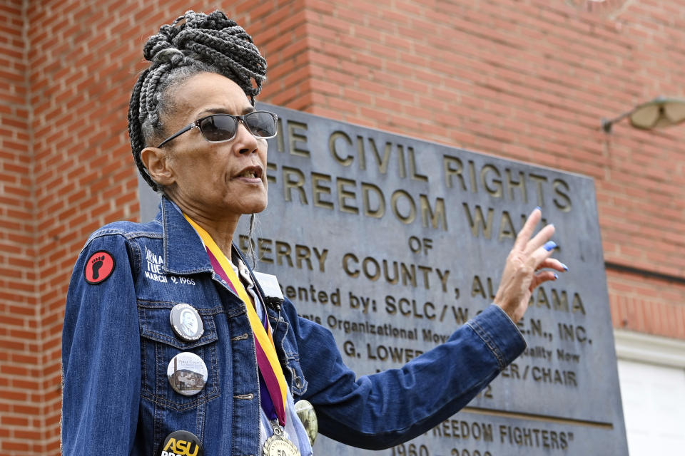 Civil Rights foot soldier Della Simpson Maynor retraces her steps on May 19, 2023, from the night she was clubbed by police on Feb. 18, 1965, at the scene of a confrontation outside Zion Church in Marion, Alabama. Maynor was 14-years-old at the time and was part of a group planning to march to the Perry County jail where a local SCLC field secretary was being held for registering voters. She also heard the gunshots that fatally wounded activist Jimmie Lee Jackson. (AP Photo/Julie Bennett)