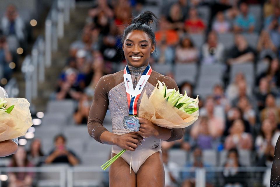 "Simone Biles: Rising" will begin streaming July 17 on Netflix. The docuseries traces the return to competition by Biles, shown here at the U.S. championships, after a case of "the twisties" at the Tokyo Olympics.