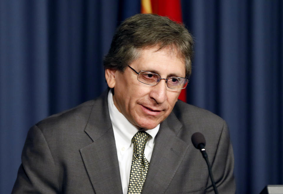 FILE - In this March 5, 2015, file photo, Maricopa county prosecutor Juan Martinez speaks during a news conference in Phoenix. The Arizona Supreme Court is scheduled to rule Thursday, April 30, 2020, in an ethics case against the prosecutor for his conduct in the Jodi Arias trial and other cases. The State Bar of Arizona, which alleged Martinez had shown a pervasive pattern of misconduct, asked the court to reverse a disciplinary panel's finding favorable to Juan Martinez. (AP Photo/Matt York, File)