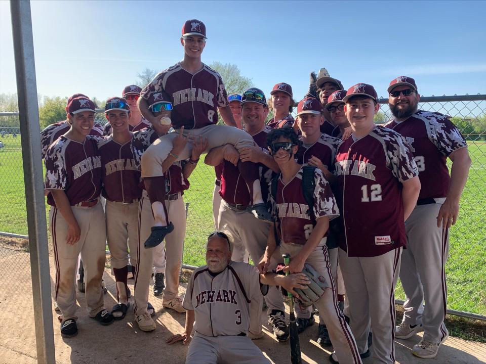 Preston Berrios with Newark teammates after pitching a perfect game against Midlakes.