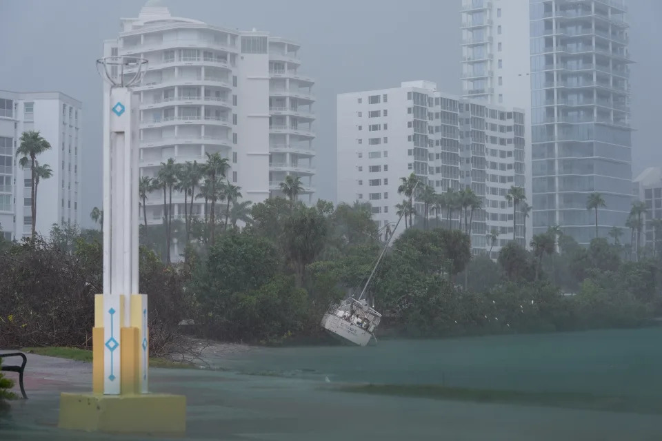 SARASOTA, FLORIDA, UNITED STATES - OCTOBER 9: A boat struggles to stand still as Hurricane Milton bears down on the Gulf Coast in Sarasota, Florida, United States on October 9, 2024. Residents of Sarasota brace for severe weather and potential evacuations. The storm, which has intensified rapidly, is expected to bring heavy rainfall, strong winds, and flooding to the area. (Photo by Lokman Vural Elibol/Anadolu via Getty Images)