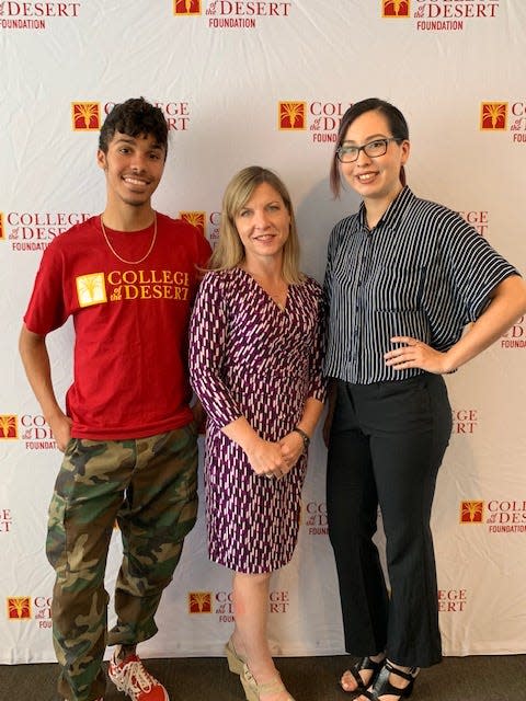 College of the Desert graduates Shane Tate, left, and Alexandria Rosales, right, with Desert Sun Executive Editor Julie Makinen. Tate and Rosales worked as interns at The Desert Sun in 2019.