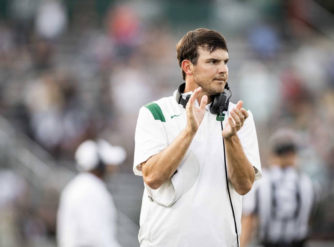 Charlotte headcoach Will Healy celebrates a 3rd down and short during late 2nd quarter action. The Charlotte 49ers Football team would host the Gardner Webb Bulldogs on Saturday September 11, 2021 at Jerry Richardson Stadium.